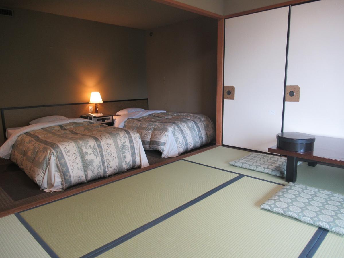 Kikuchi Kanko Hotel Buitenkant foto