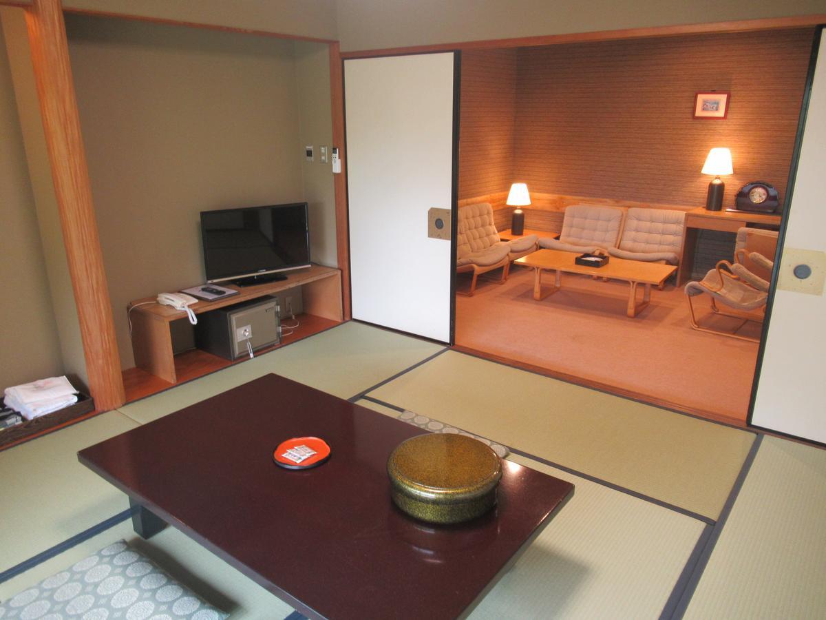Kikuchi Kanko Hotel Buitenkant foto